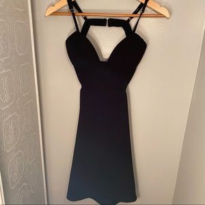 Bodycon size S mini black cut out Fashion Nova dress, gold detail back straps